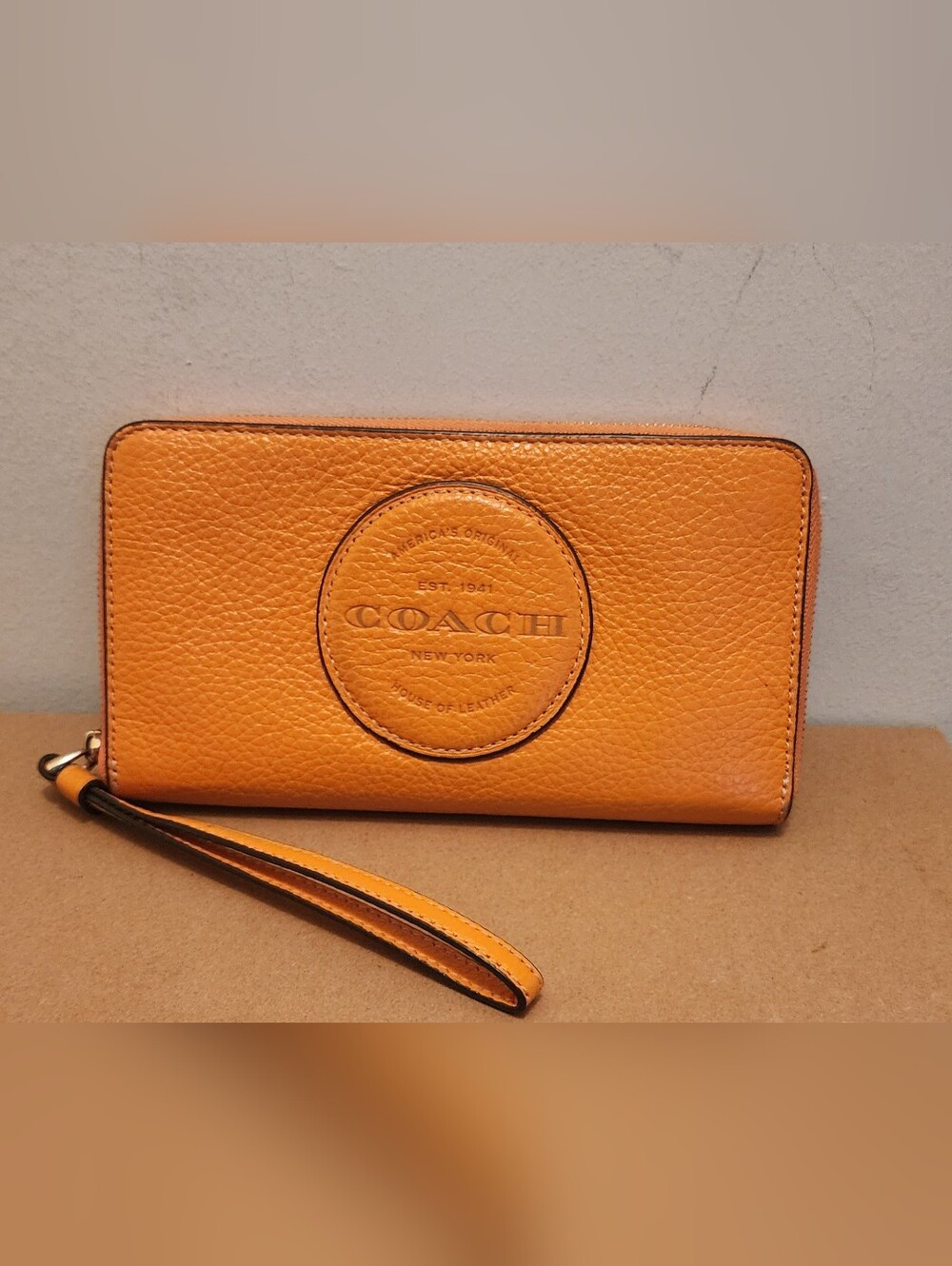 Coach Pebbled Leather Wristlet in Vibrant Orange - Picture 1 of 3